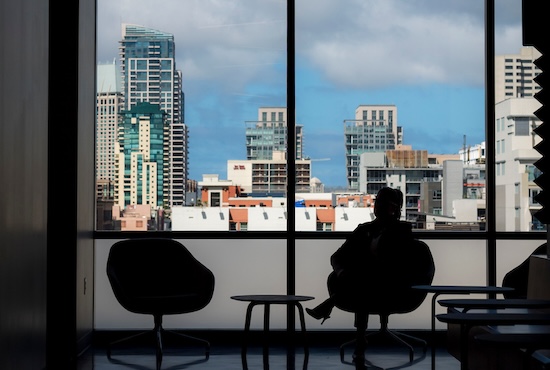 sitting person viewing skyline